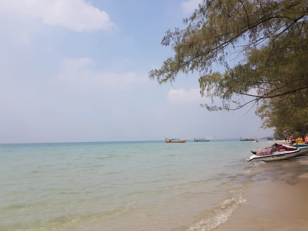 Cruising with Danny and Peter, Holland America Line, Westerdam, Sihanoukville, Cambodia | Pagoda visit in Sihanoukville during a cultural experience, featuring a monk blessing ceremony, vibrant local market tour, and serene beach retreat for a memorable spiritual and cultural day trip in Cambodia.