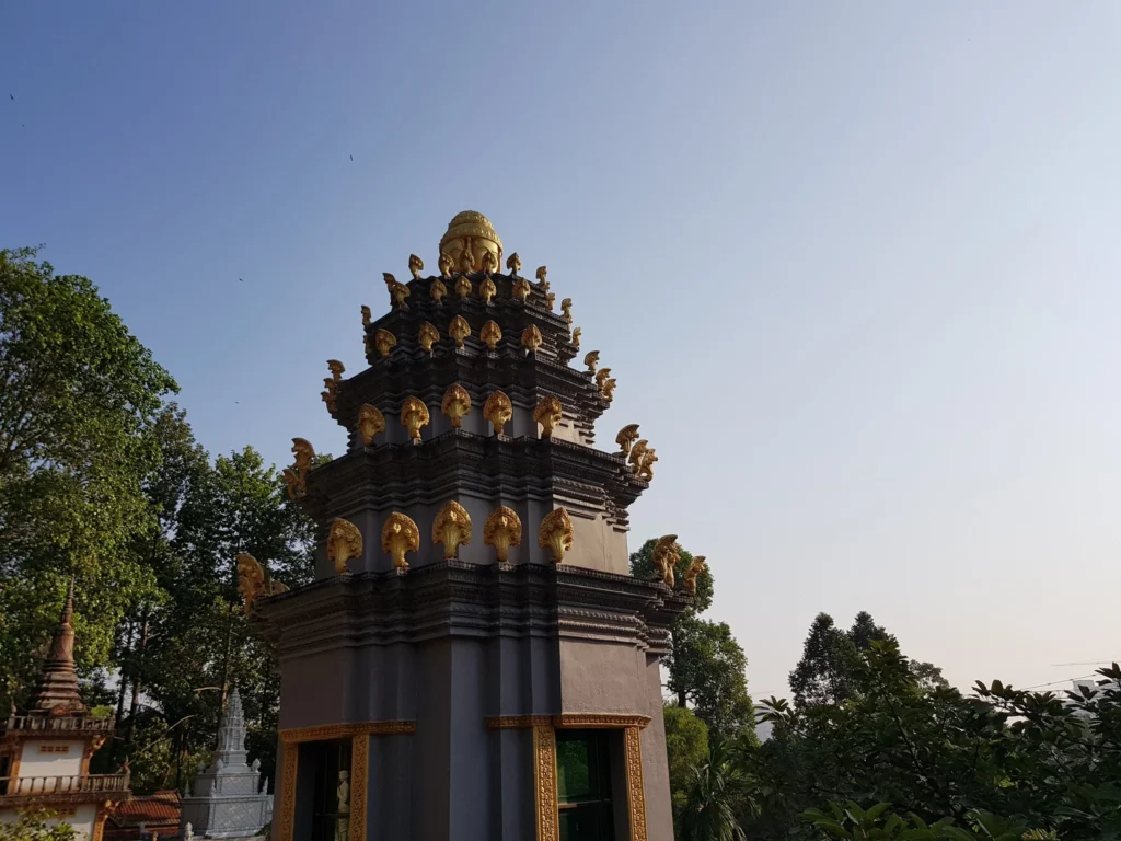 Cruising with Danny and Peter, Holland America Line, Westerdam, Sihanoukville, Cambodia | Pagoda visit in Sihanoukville during a cultural experience, featuring a monk blessing ceremony, vibrant local market tour, and serene beach retreat for a memorable spiritual and cultural day trip in Cambodia.