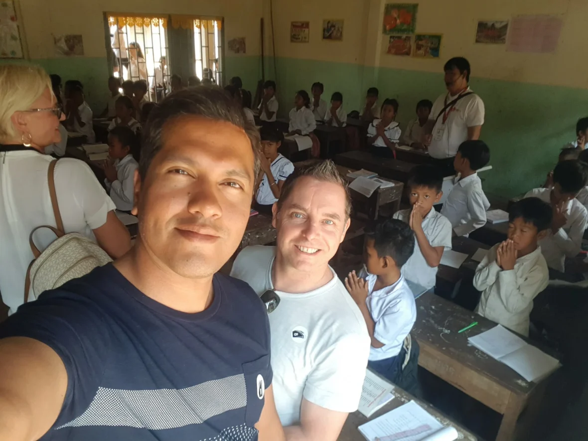 Cruising with Danny and Peter, Holland America Line, Westerdam, Sihanoukville, Cambodia | Pagoda visit in Sihanoukville during a cultural experience, featuring a monk blessing ceremony, vibrant local market tour, and serene beach retreat for a memorable spiritual and cultural day trip in Cambodia.