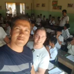 Cruising with Danny and Peter, Holland America Line, Westerdam, Sihanoukville, Cambodia | Pagoda visit in Sihanoukville during a cultural experience, featuring a monk blessing ceremony, vibrant local market tour, and serene beach retreat for a memorable spiritual and cultural day trip in Cambodia.