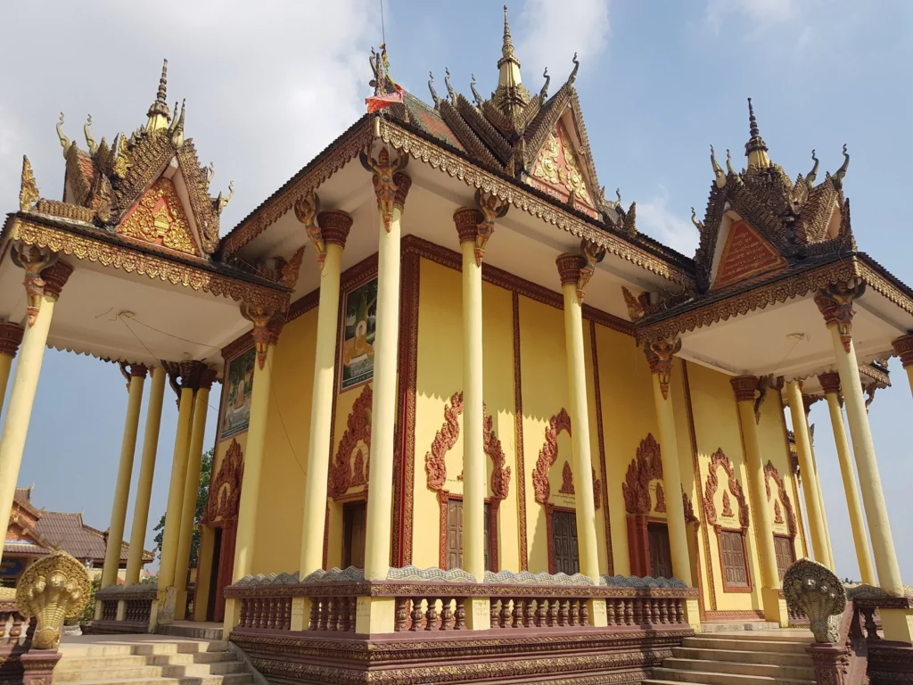 Cruising with Danny and Peter, Holland America Line, Westerdam, Sihanoukville, Cambodia | Pagoda visit in Sihanoukville during a cultural experience, featuring a monk blessing ceremony, vibrant local market tour, and serene beach retreat for a memorable spiritual and cultural day trip in Cambodia.