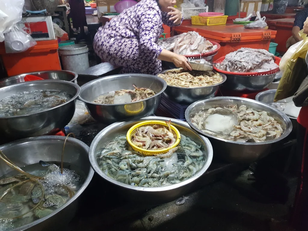 Cruising with Danny and Peter, Holland America Line, Westerdam, Sihanoukville, Cambodia | Pagoda visit in Sihanoukville during a cultural experience, featuring a monk blessing ceremony, vibrant local market tour, and serene beach retreat for a memorable spiritual and cultural day trip in Cambodia.