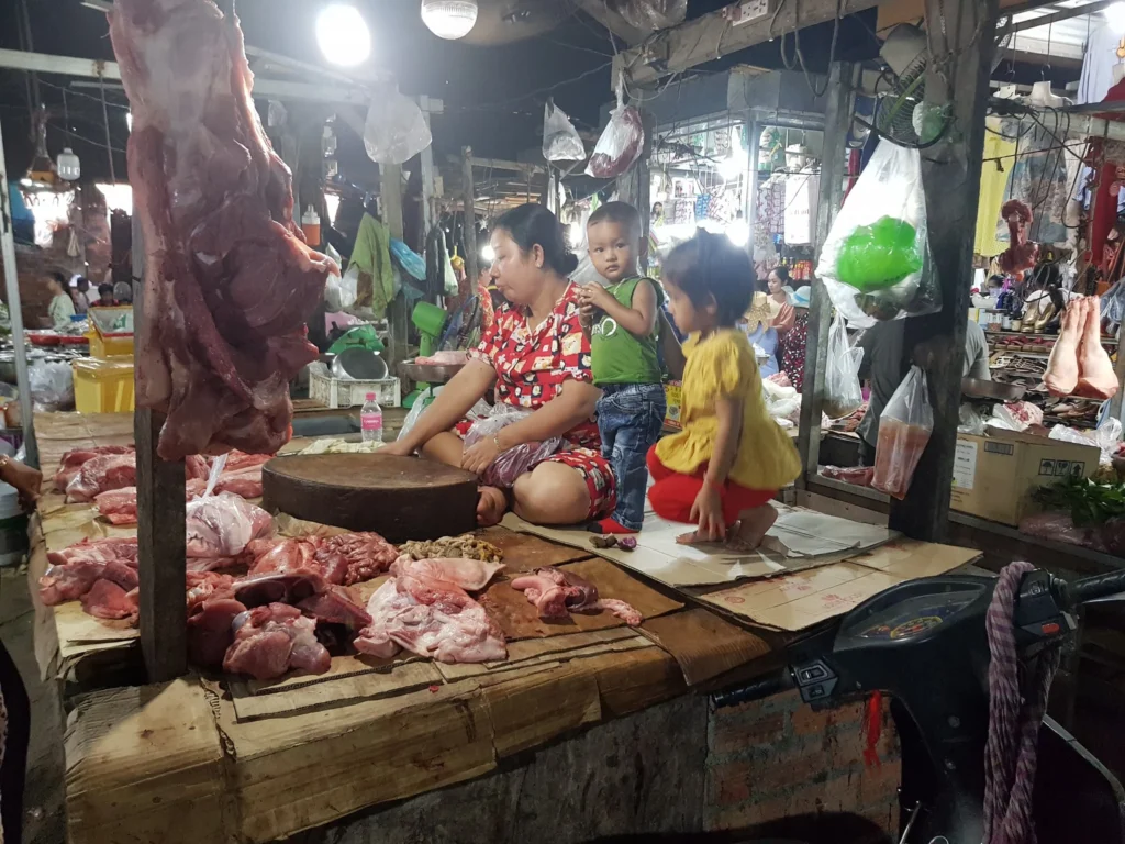 Cruising with Danny and Peter, Holland America Line, Westerdam, Sihanoukville, Cambodia | Pagoda visit in Sihanoukville during a cultural experience, featuring a monk blessing ceremony, vibrant local market tour, and serene beach retreat for a memorable spiritual and cultural day trip in Cambodia.