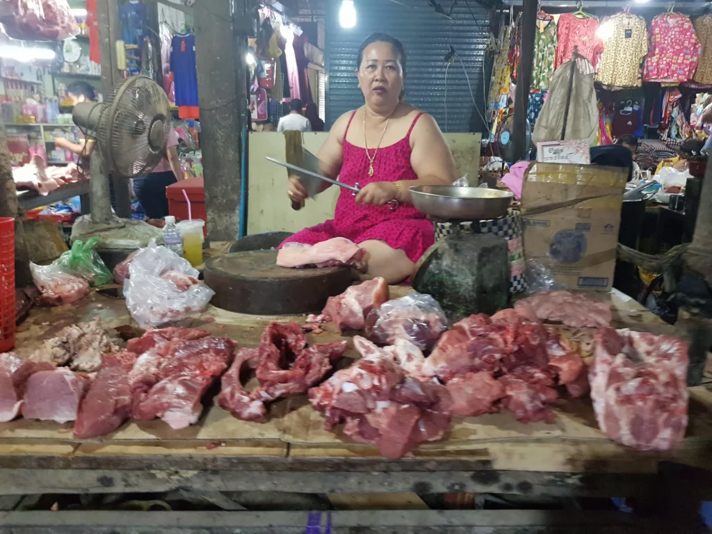 Cruising with Danny and Peter, Holland America Line, Westerdam, Sihanoukville, Cambodia | Pagoda visit in Sihanoukville during a cultural experience, featuring a monk blessing ceremony, vibrant local market tour, and serene beach retreat for a memorable spiritual and cultural day trip in Cambodia.