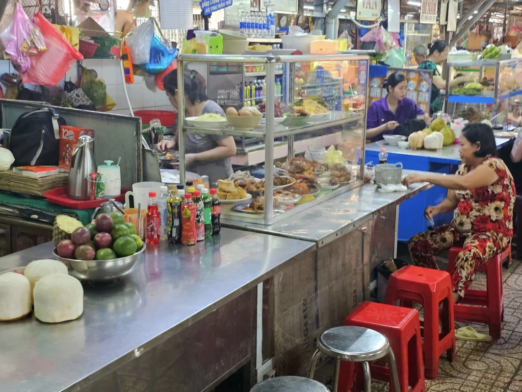 Cruising with Danny and Peter, Holland America Line, Westerdam, Phu My, Ho Chi Minh, Vietnam, Ho Chi Minh City Historical Tour | A Ho Chi Minh City Historical Tour featuring Saigon Historical Exploration: visitors marvel at Vietnamese Cultural Heritage in Ho Chi Minh City Museums, admire the French Colonial Architecture of Notre Dame Cathedral Saigon and the Central Post Office on a Saigon Landmarks Tour, enjoy the vibrant Ben Thanh Market Experience, reflect at the Independence Palace Visit during a Vietnam War History Tour, and share a heartfelt reunion with a guide from a Holland America Cruise Vietnam.