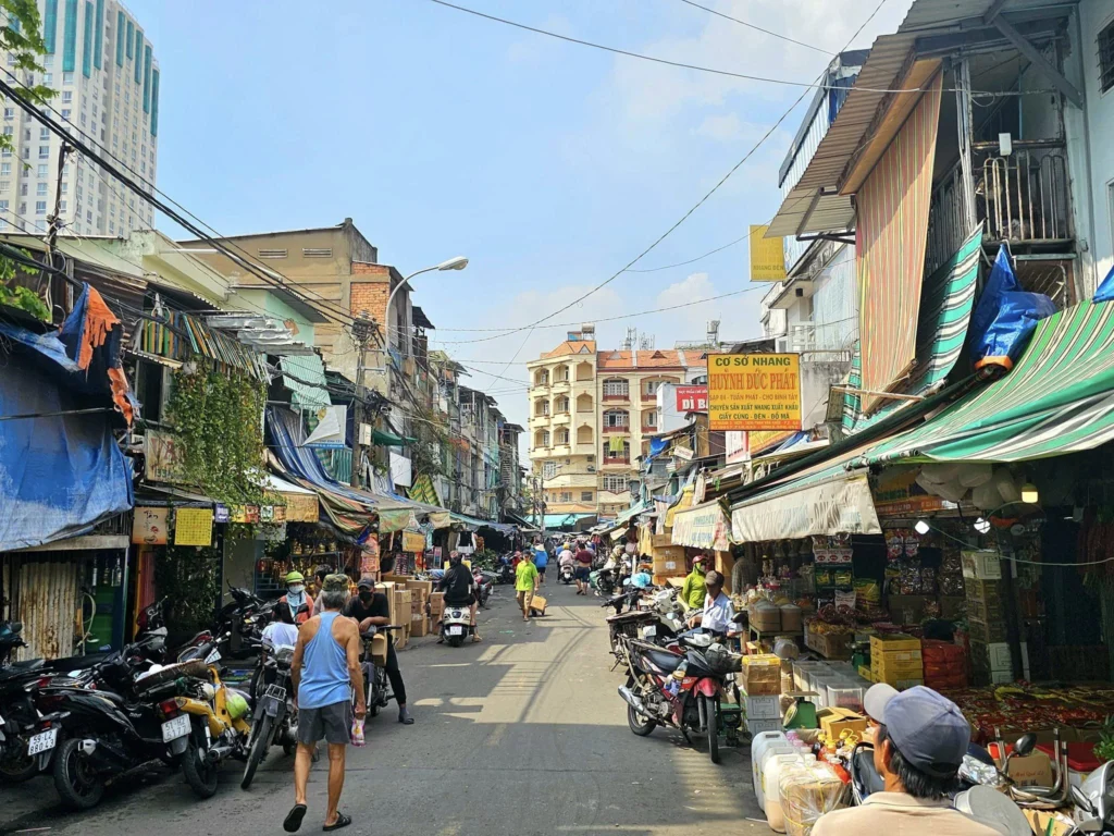 Cruising with Danny and Peter, Holland America Line, Westerdam, Phu My, Ho Chi Minh, Vietnam, Ho Chi Minh City Historical Tour | A Ho Chi Minh City Historical Tour featuring Saigon Historical Exploration: visitors marvel at Vietnamese Cultural Heritage in Ho Chi Minh City Museums, admire the French Colonial Architecture of Notre Dame Cathedral Saigon and the Central Post Office on a Saigon Landmarks Tour, enjoy the vibrant Ben Thanh Market Experience, reflect at the Independence Palace Visit during a Vietnam War History Tour, and share a heartfelt reunion with a guide from a Holland America Cruise Vietnam.