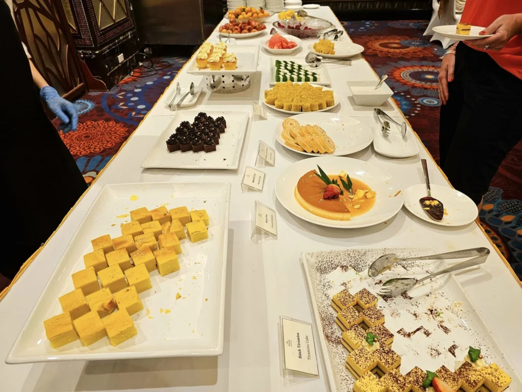 Cruising with Danny and Peter, Holland America Line, Westerdam, Phu My, Ho Chi Minh, Vietnam, Ho Chi Minh City Historical Tour | A Ho Chi Minh City Historical Tour featuring Saigon Historical Exploration: visitors marvel at Vietnamese Cultural Heritage in Ho Chi Minh City Museums, admire the French Colonial Architecture of Notre Dame Cathedral Saigon and the Central Post Office on a Saigon Landmarks Tour, enjoy the vibrant Ben Thanh Market Experience, reflect at the Independence Palace Visit during a Vietnam War History Tour, and share a heartfelt reunion with a guide from a Holland America Cruise Vietnam.