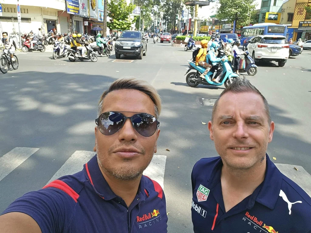 Cruising with Danny and Peter, Holland America Line, Westerdam, Phu My, Ho Chi Minh, Vietnam, Ho Chi Minh City Historical Tour | A Ho Chi Minh City Historical Tour featuring Saigon Historical Exploration: visitors marvel at Vietnamese Cultural Heritage in Ho Chi Minh City Museums, admire the French Colonial Architecture of Notre Dame Cathedral Saigon and the Central Post Office on a Saigon Landmarks Tour, enjoy the vibrant Ben Thanh Market Experience, reflect at the Independence Palace Visit during a Vietnam War History Tour, and share a heartfelt reunion with a guide from a Holland America Cruise Vietnam.