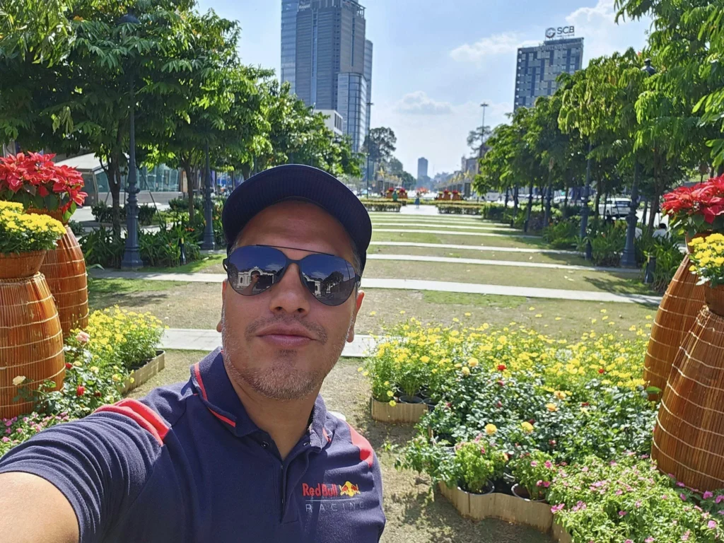 Cruising with Danny and Peter, Holland America Line, Westerdam, Phu My, Ho Chi Minh, Vietnam, Ho Chi Minh City Historical Tour | A Ho Chi Minh City Historical Tour featuring Saigon Historical Exploration: visitors marvel at Vietnamese Cultural Heritage in Ho Chi Minh City Museums, admire the French Colonial Architecture of Notre Dame Cathedral Saigon and the Central Post Office on a Saigon Landmarks Tour, enjoy the vibrant Ben Thanh Market Experience, reflect at the Independence Palace Visit during a Vietnam War History Tour, and share a heartfelt reunion with a guide from a Holland America Cruise Vietnam.