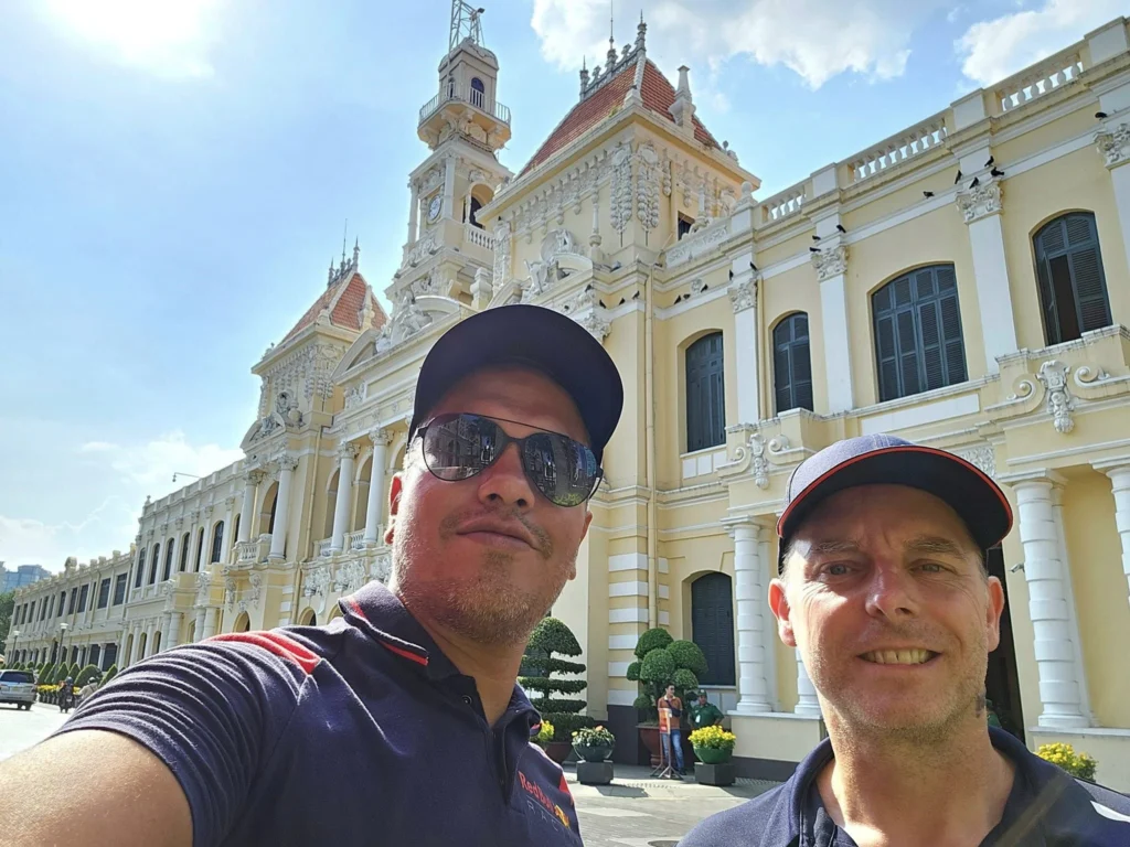 Cruising with Danny and Peter, Holland America Line, Westerdam, Phu My, Ho Chi Minh, Vietnam, Ho Chi Minh City Historical Tour | A Ho Chi Minh City Historical Tour featuring Saigon Historical Exploration: visitors marvel at Vietnamese Cultural Heritage in Ho Chi Minh City Museums, admire the French Colonial Architecture of Notre Dame Cathedral Saigon and the Central Post Office on a Saigon Landmarks Tour, enjoy the vibrant Ben Thanh Market Experience, reflect at the Independence Palace Visit during a Vietnam War History Tour, and share a heartfelt reunion with a guide from a Holland America Cruise Vietnam.