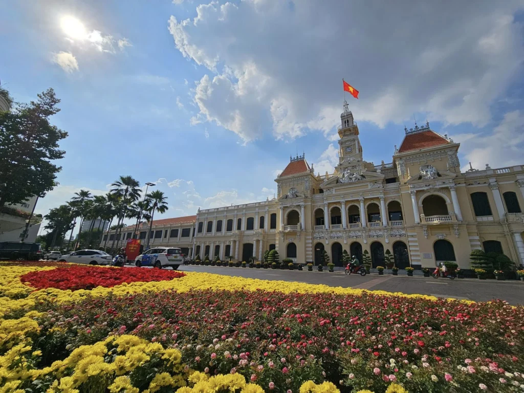 Cruising with Danny and Peter, Holland America Line, Westerdam, Phu My, Ho Chi Minh, Vietnam, Ho Chi Minh City Historical Tour | A Ho Chi Minh City Historical Tour featuring Saigon Historical Exploration: visitors marvel at Vietnamese Cultural Heritage in Ho Chi Minh City Museums, admire the French Colonial Architecture of Notre Dame Cathedral Saigon and the Central Post Office on a Saigon Landmarks Tour, enjoy the vibrant Ben Thanh Market Experience, reflect at the Independence Palace Visit during a Vietnam War History Tour, and share a heartfelt reunion with a guide from a Holland America Cruise Vietnam.