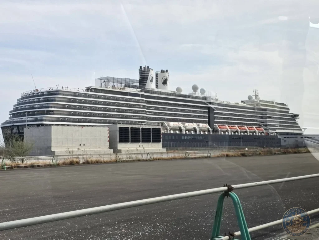 Holland America Westerdam cruise ship docked at Kochi Port in Kochi, Japan. Large cruise vessel at the pier. Kochi Cruise Port Guide | Things to do in Kochi from cruise ship | One day in Kochi Japan itinerary by Danny and Peter.