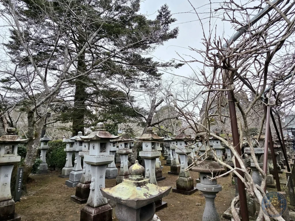 Rows of stone lanterns and memorials honoring the Kamikaze pilots at the Chiran Peace Museum. Moving tribute to the Special Attack Forces located in the Chiran Samurai District, Kagoshima, Japan. Kagoshima Cruise Port Guide | Things to do in Kagoshima from cruise ship | One day in Kagoshima Japan itinerary by Danny and Peter.