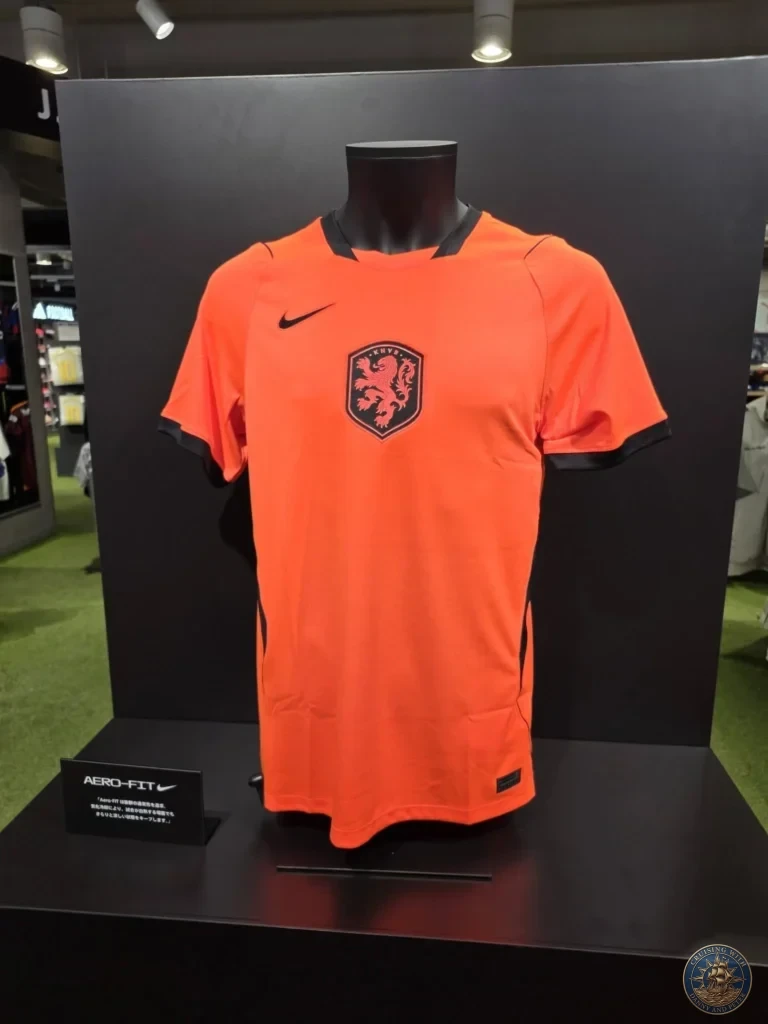 Bright orange Netherlands football jersey on display at Canal City Hakata in Fukuoka, Japan. Shopping highlight. Fukuoka Cruise Port Guide | Things to do in Fukuoka from cruise ship | One day in Fukuoka Japan itinerary by Danny and Peter.