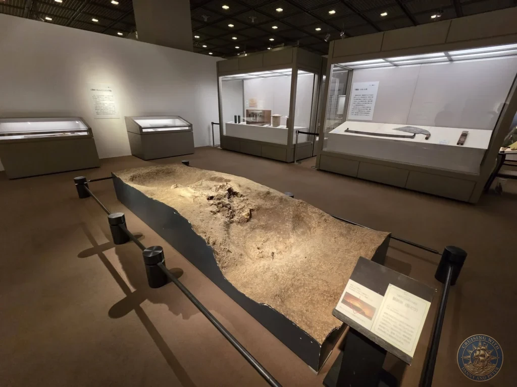 Large preserved ancient boat or dugout on display at Fukuoka City Museum in Japan. Archaeological highlight. Fukuoka Cruise Port Guide | Things to do in Fukuoka from cruise ship | One day in Fukuoka Japan itinerary by Danny and Peter.