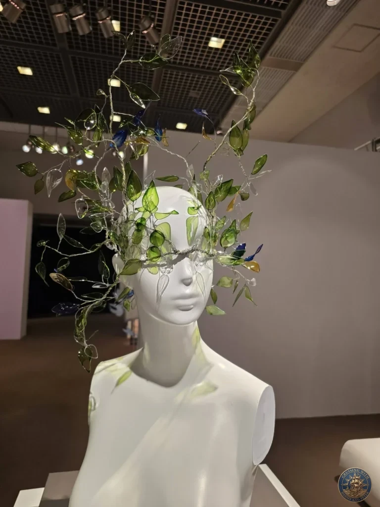 Dramatic glass and crystal leafy branch headpiece on mannequin at Fukuoka City Museum, Japan. Contemporary sculpture. Fukuoka Cruise Port Guide | Things to do in Fukuoka from cruise ship | One day in Fukuoka Japan itinerary by Danny and Peter.