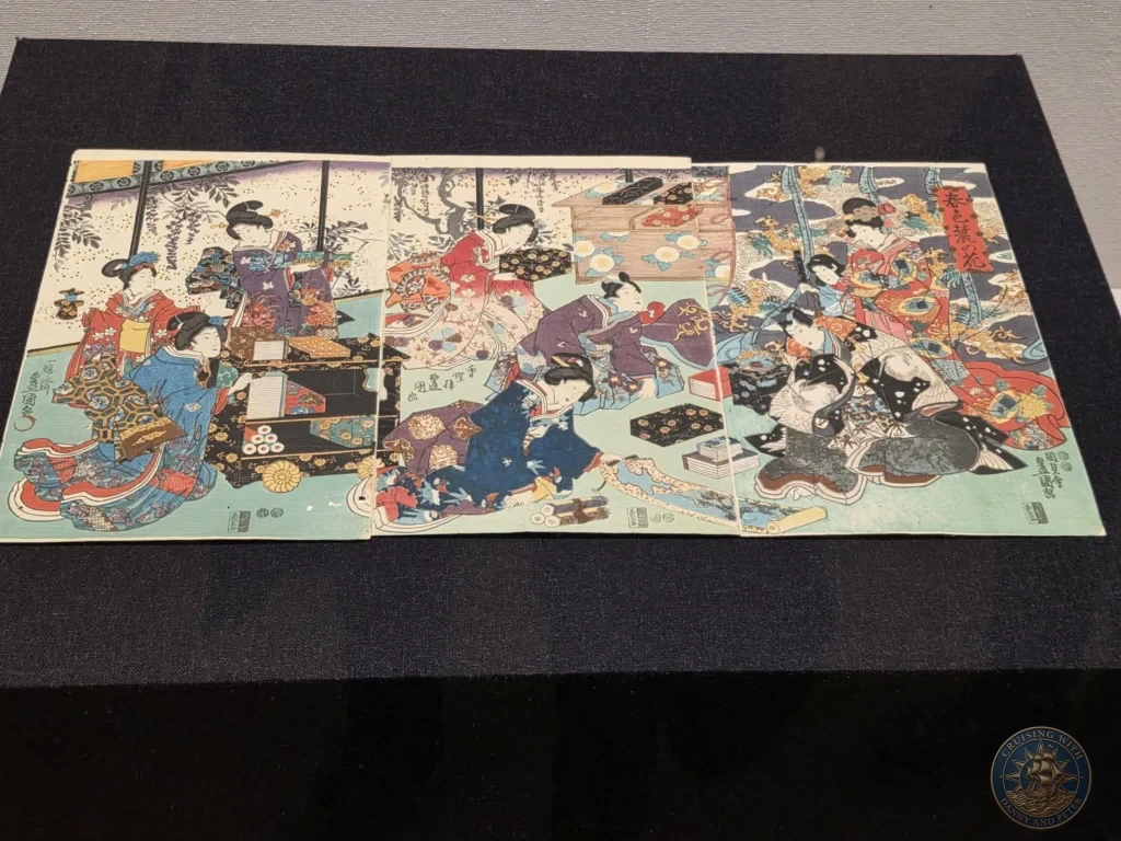 Colorful ukiyo-e woodblock print triptych of women in kimonos at Fukuoka City Museum, Japan. Traditional Japanese art. Fukuoka Cruise Port Guide | Things to do in Fukuoka from cruise ship | One day in Fukuoka Japan itinerary by Danny and Peter.