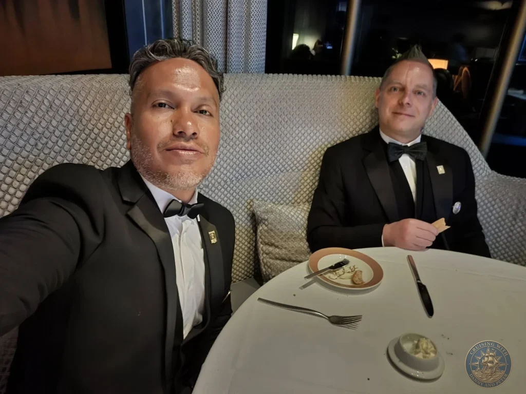 Danny and Peter in formal attire at Pinnacle Grill on Holland America Westerdam in Kochi, Japan. Cruise ship fine dining evening. Kochi Cruise Port Guide | Things to do in Kochi from cruise ship | One day in Kochi Japan itinerary by Danny and Peter.