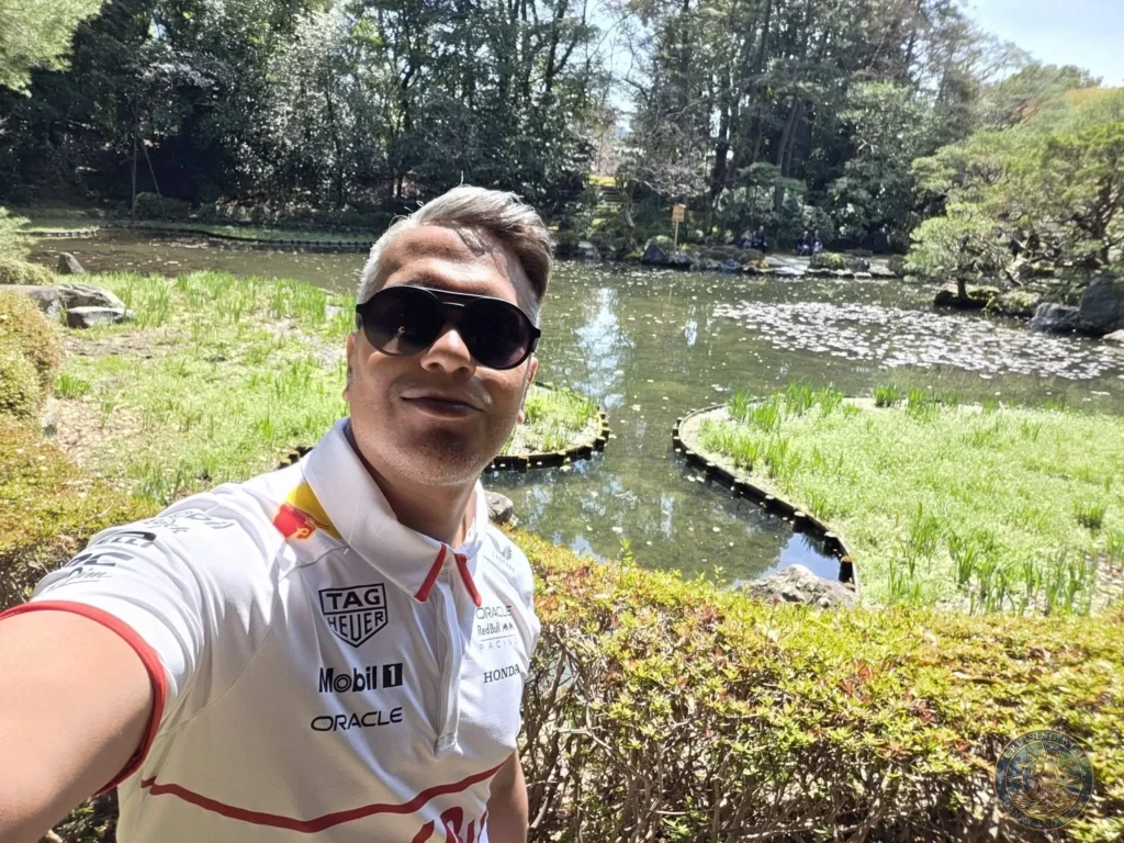 Kobe Japan Cruise Port Guide 2026 – Insider Tips & One Day Itinerary 54 Danny taking a selfie by the pond and gardens of Heian Shrine under bright sunlight in Kyoto, Japan. Shrine gardens from Kobe port day. Kobe Japan Cruise Port Guide | DIY Kobe Cruise Port to City Center | Things to do in Kobe from cruise ship | Westerdam Kobe Docking Location | One day in Kobe Japan itinerary by Danny and Peter.
