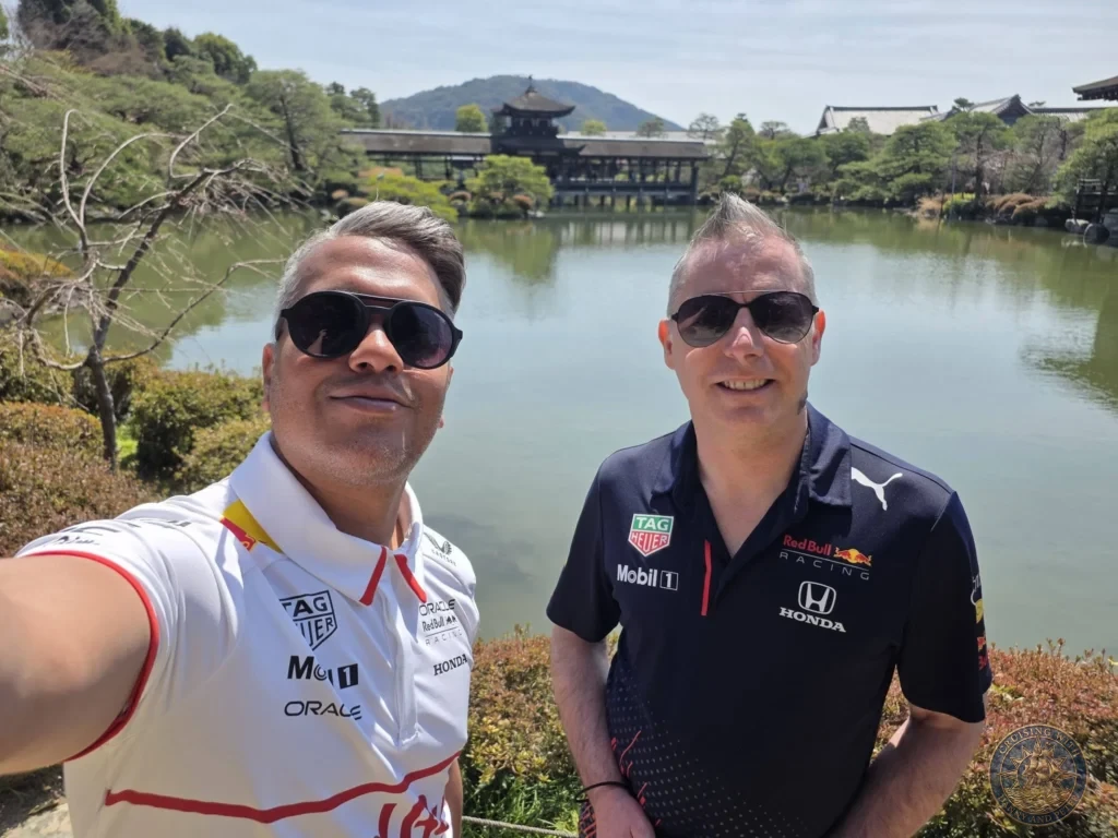 Kobe Japan Cruise Port Guide 2026 – Insider Tips & One Day Itinerary 62 Danny and Peter taking a selfie by the pond with traditional buildings in the background at Heian Shrine under a blue sky in Kyoto, Japan. Shrine gardens from Kobe port day. Kobe Japan Cruise Port Guide | DIY Kobe Cruise Port to City Center | Things to do in Kobe from cruise ship | Westerdam Kobe Docking Location | One day in Kobe Japan itinerary by Danny and Peter.