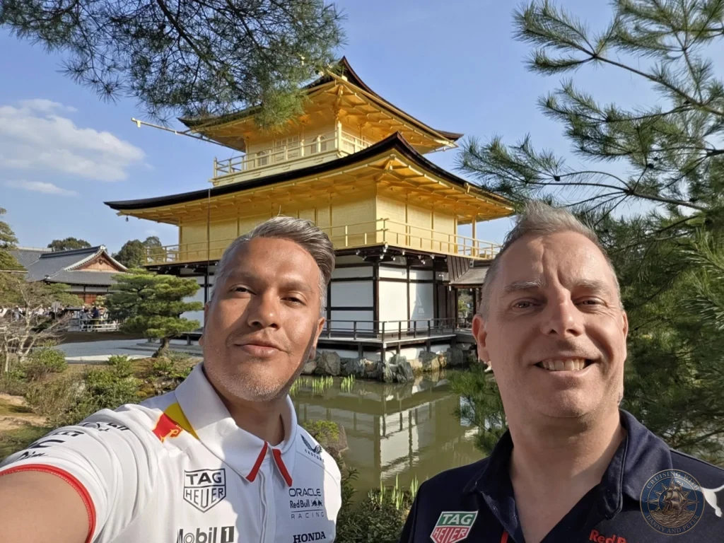 Kobe Japan Cruise Port Guide 2026 – Insider Tips & One Day Itinerary 38 Danny and Peter taking a selfie in front of the Golden Pavilion (Kinkaku-ji) in Kyoto, Japan. Iconic temple visit from Kobe cruise port. Kobe Japan Cruise Port Guide | DIY Kobe Cruise Port to City Center | Things to do in Kobe from cruise ship | Westerdam Kobe Docking Location | One day in Kobe Japan itinerary by Danny and Peter.