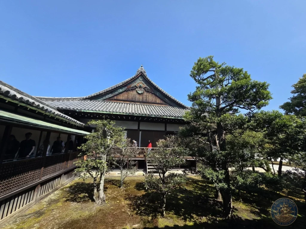 Kobe Japan Cruise Port Guide 2026 – Insider Tips & One Day Itinerary 156 Traditional wooden palace building with tiled roof and moss garden at Nijo Castle in Kyoto, Japan. Historic site from Kobe port day. Kobe Japan Cruise Port Guide | DIY Kobe Cruise Port to City Center | Things to do in Kobe from cruise ship | Westerdam Kobe Docking Location | One day in Kobe Japan itinerary by Danny and Peter.