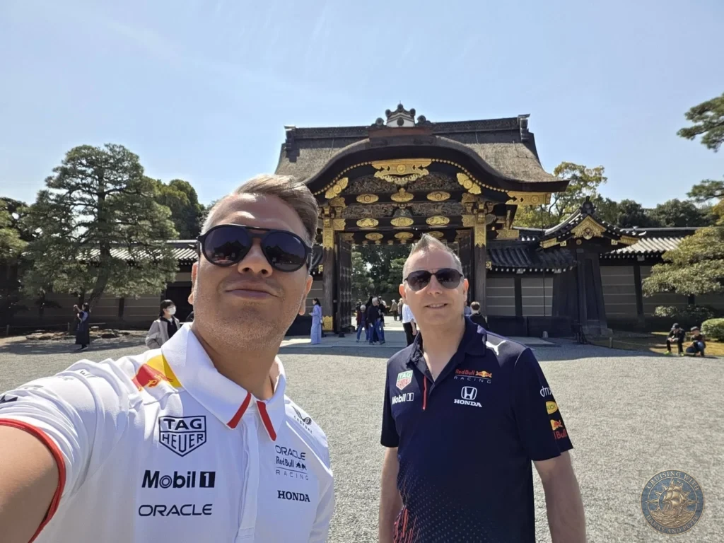 Kobe Japan Cruise Port Guide 2026 – Insider Tips & One Day Itinerary 23 Danny and Peter taking a selfie in front of the ornate gate at Nijo Castle in Kyoto, Japan. Historic castle visit from Kobe. Kobe Japan Cruise Port Guide | DIY Kobe Cruise Port to City Center | Things to do in Kobe from cruise ship | Westerdam Kobe Docking Location | One day in Kobe Japan itinerary by Danny and Peter.