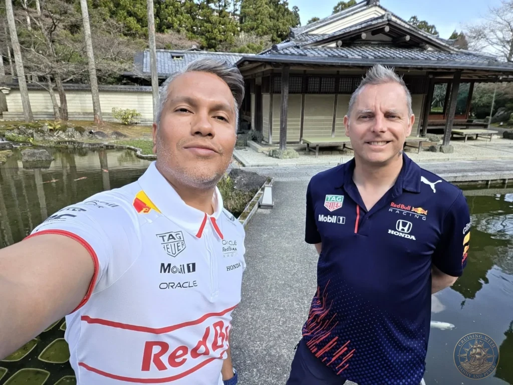 Kobe Japan Cruise Port Guide 2026 – Insider Tips & One Day Itinerary 144 Danny and Peter taking a selfie by the pond in front of a traditional Japanese building at Shozan Resort Garden in Kyoto, Japan. Peaceful garden stop from Kobe port day. Kobe Japan Cruise Port Guide | DIY Kobe Cruise Port to City Center | Things to do in Kobe from cruise ship | Westerdam Kobe Docking Location | One day in Kobe Japan itinerary by Danny and Peter.