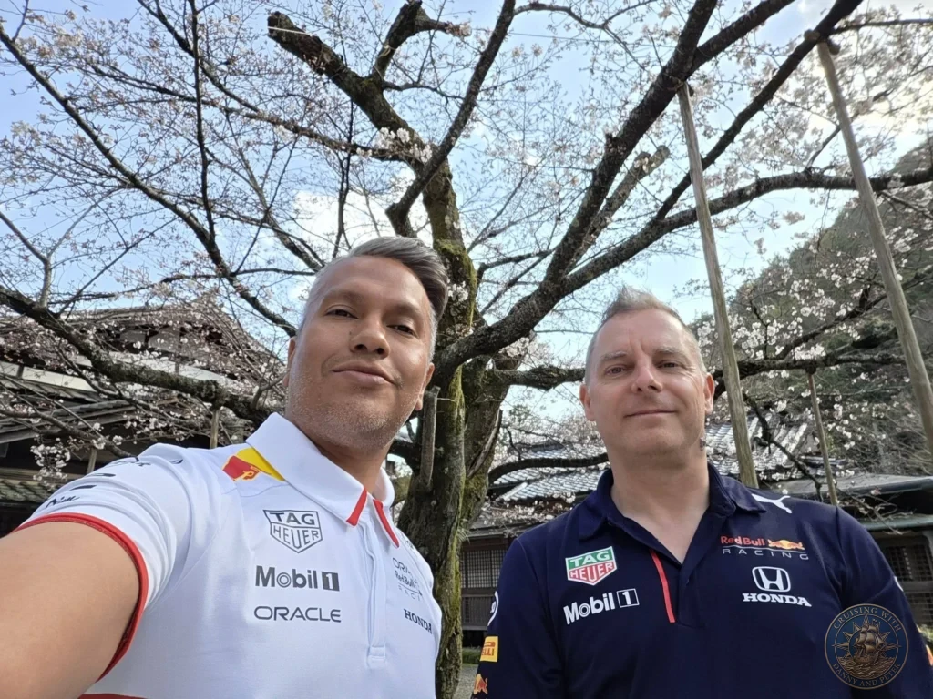 Kobe Japan Cruise Port Guide 2026 – Insider Tips & One Day Itinerary 89 Danny and Peter taking a selfie under a blooming cherry blossom tree at Shozan Resort Garden in Kyoto, Japan. Spring garden stop from Kobe port day. Kobe Japan Cruise Port Guide | DIY Kobe Cruise Port to City Center | Things to do in Kobe from cruise ship | Westerdam Kobe Docking Location | One day in Kobe Japan itinerary by Danny and Peter.