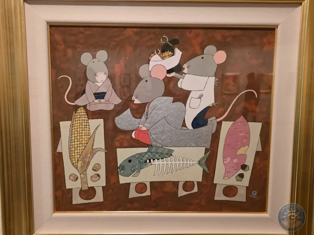 Framed Japanese illustration featuring anthropomorphic mice, corn, fish, and sweet potato on display in the Children's Picture Gallery at the Adachi Museum of Art during a shore excursion from Sakaiminato Japan Cruise Port Guide, DIY Sakaiminato Cruise Port to City Center, Things to do in Sakaiminato from cruise ship, Westerdam Sakaiminato Docking Location, One day in Sakaiminato Japan itinerary by Danny and Peter.