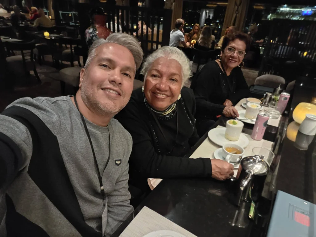 Danny taking a selfie with his mother and his aunt enjoying tea and dessert at the counter inside Morimoto by Sea onboard Holland America Line's ship Rotterdam during a cruise to Ålesund. Things to do in Ålesund from cruise ship, by Danny and Peter.